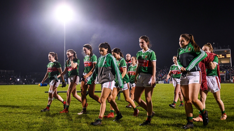 Mayo players leave the field following the defeat to Dublin