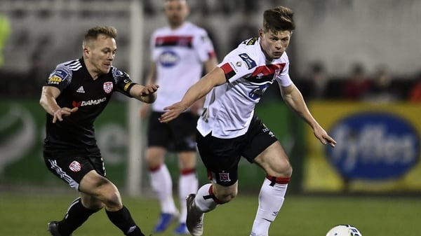 Cammy Smith of Dundalk in action against Conor McCormack of Derry City