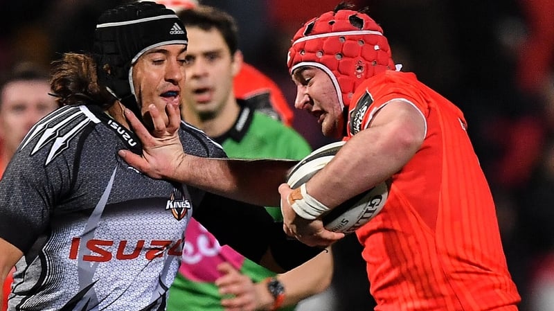 John Hodnett fends off Demetri Catrakilis to score a try on his Munster debut