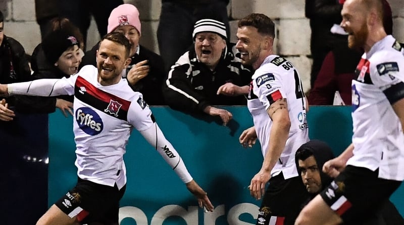 Dane Massey (left) leads the celebrations after scoring Dundalk's late winner