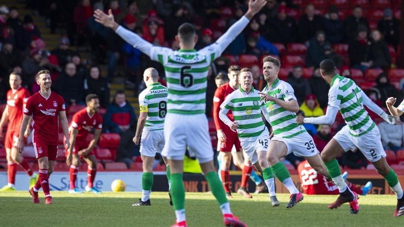 Kristoffer Ajer wheels away in celebration after scoring the winner against Aberdeen