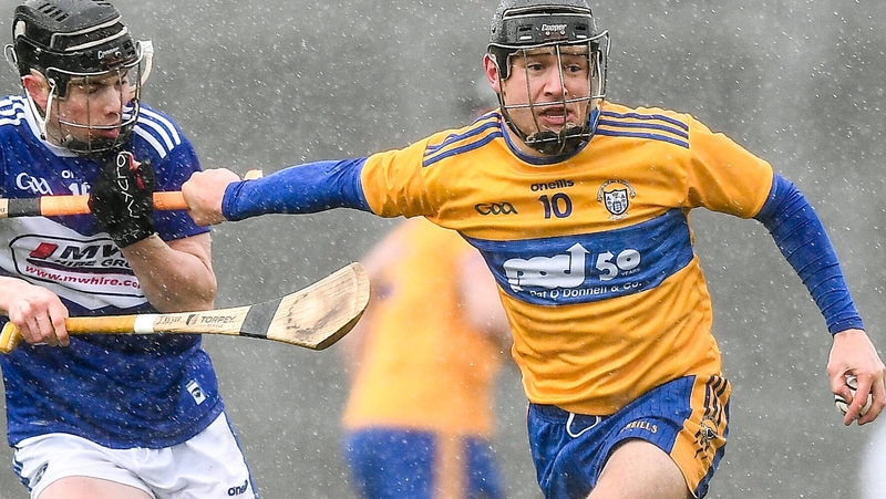 Clare forward David Reidy in action against Laois' James Keyes