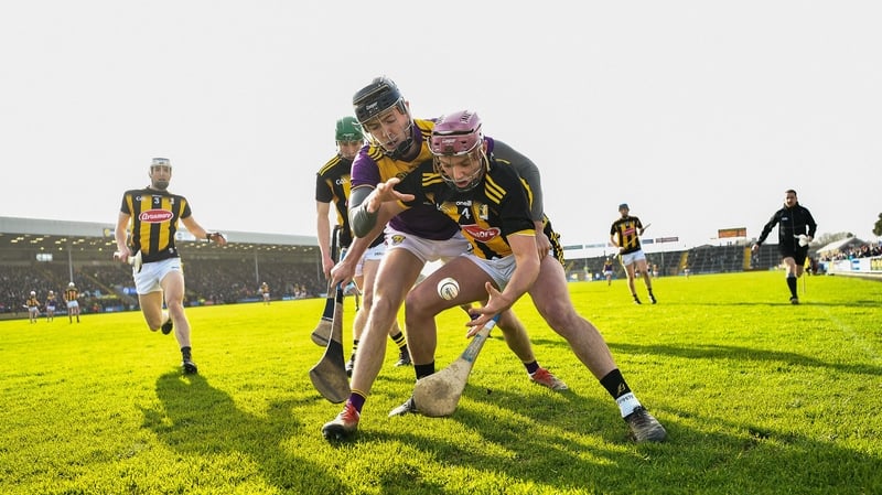 Ciaran Wallace of Kilkenny is tackled by Joe O'Connor of Wexford