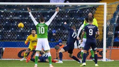 Adam Jackson heads home what proved to be the winning goal