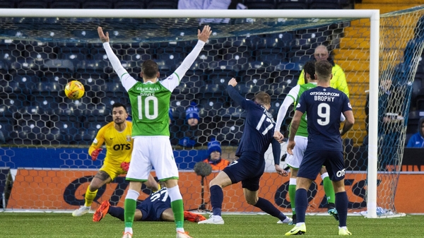 Adam Jackson heads home what proved to be the winning goal