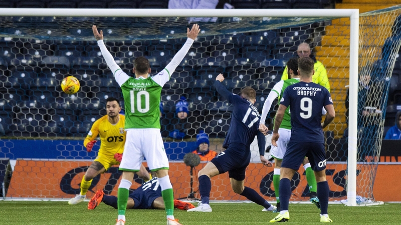 Adam Jackson heads home what proved to be the winning goal