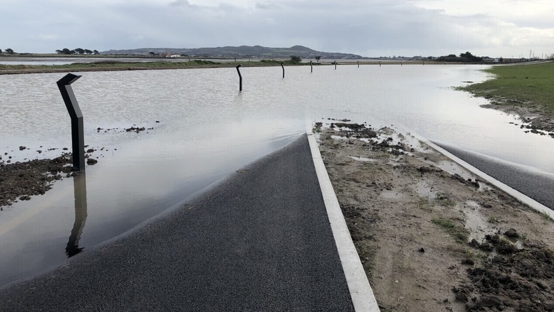 An glasbhealach idir Port Mearnóg agus Baile Dúill