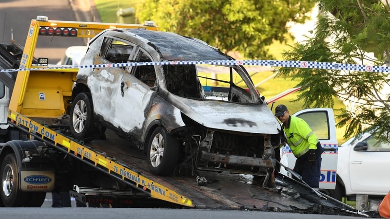 Police remove the Baxter family's vehicle from the scene in Brisbane