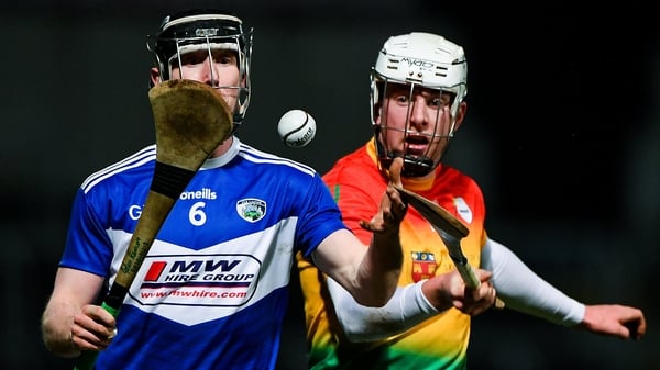 John Lennon of Laois in action against Kevin McDonald