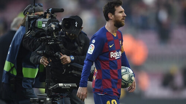 Lionel Messi with the match ball