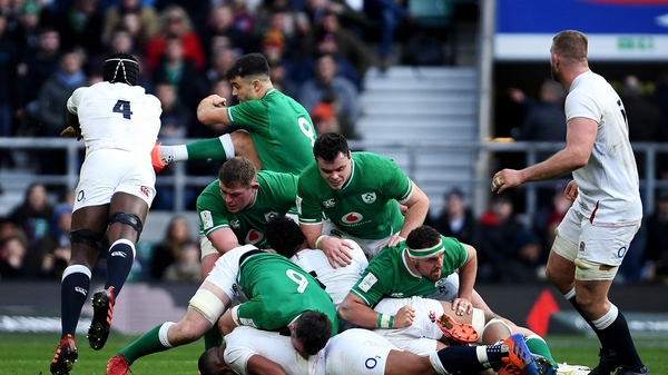 Maro Itoje charges down a Conor Murray kick at Twickenham.