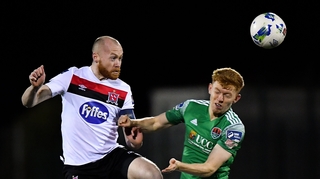 Chris Shields of Dundalk gets there ahead of Alec Byrne of Cork