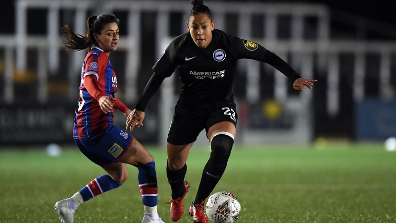 Rianna Jarrett of Brighton and Hove Albion (R) breaks past Frya Holdaway of Crystal Place