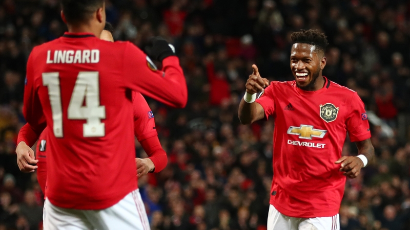 Fred (R) celebrates with team-mate Jesse Lingard