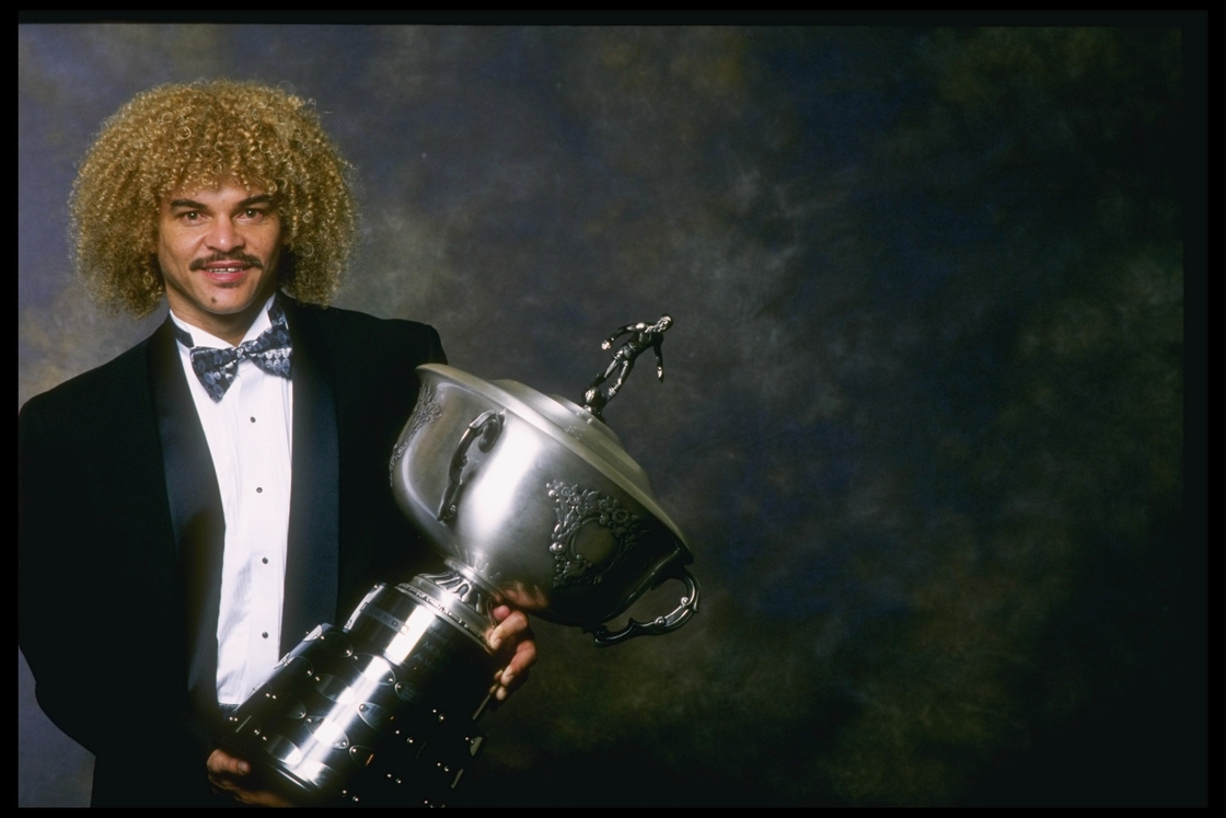 Carlos Valderrama of the Tampa Bay Mutiny holds his MVP trophy during the 1996MLS Gala Awards Dinner
