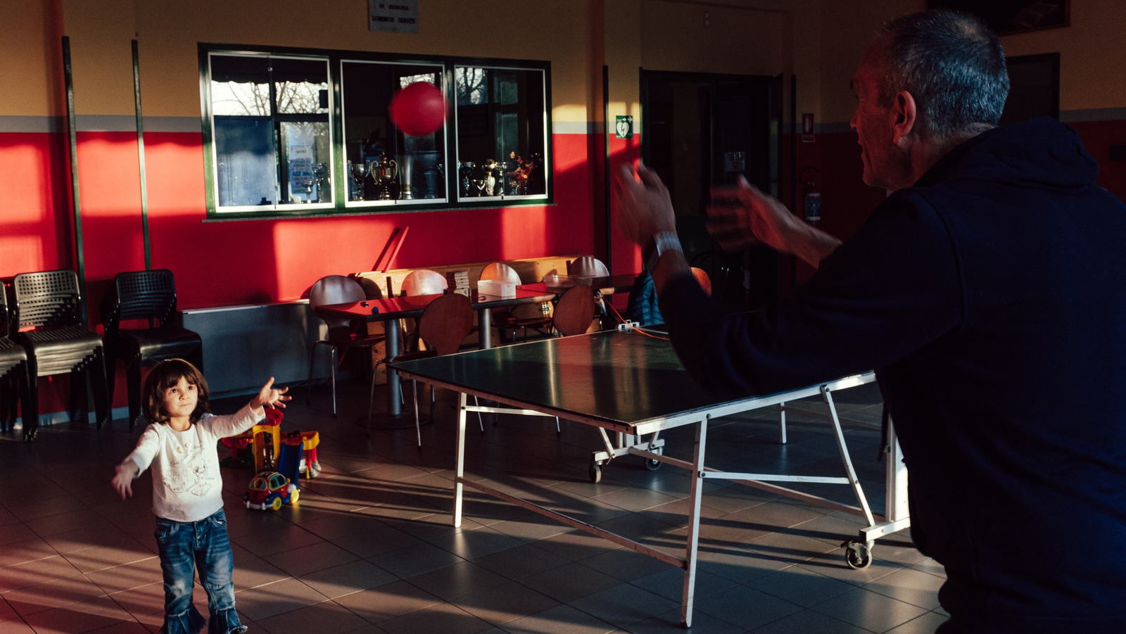 Keeping busy indoors: Marzio's family entertain themselves (Image: Marzio Toniolo)