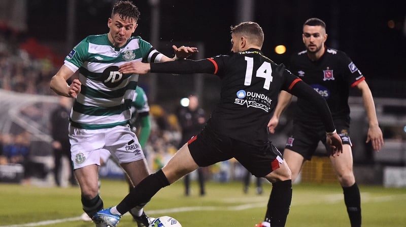 Ronan Finn of Shamrock Rovers and Dundalk's Dane Massey tussle for possession back in February
