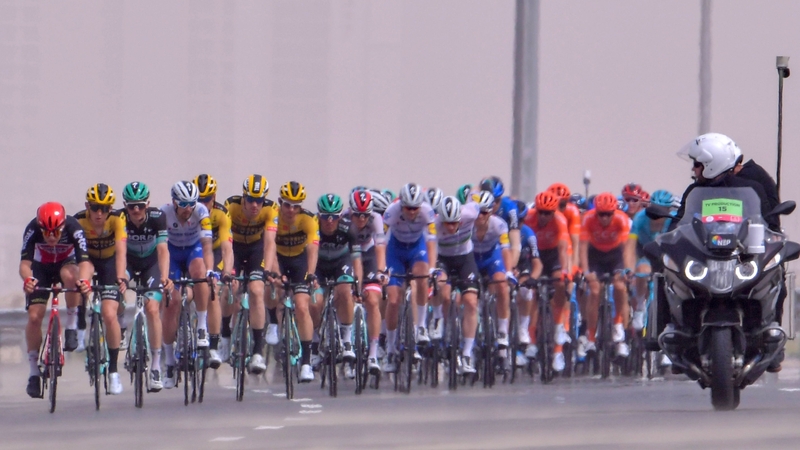 Cyclists ride during stage four of the UAE cycling tour in Dubai, on 26 February 2020