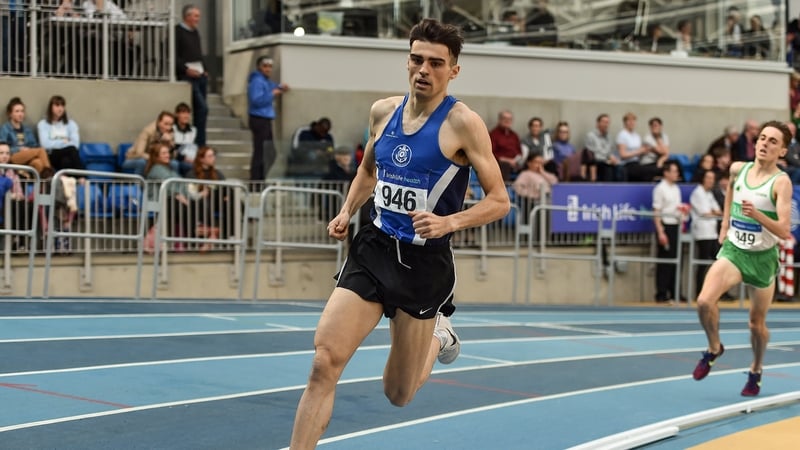ndrew Coscoran (l) on his way to winning the Senior Men's 1500m event