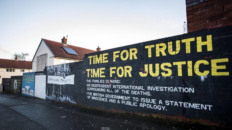 Mural on a wall in the Ballymurphy area of west Belfast where the shooting of 10 civilians took place in 1971