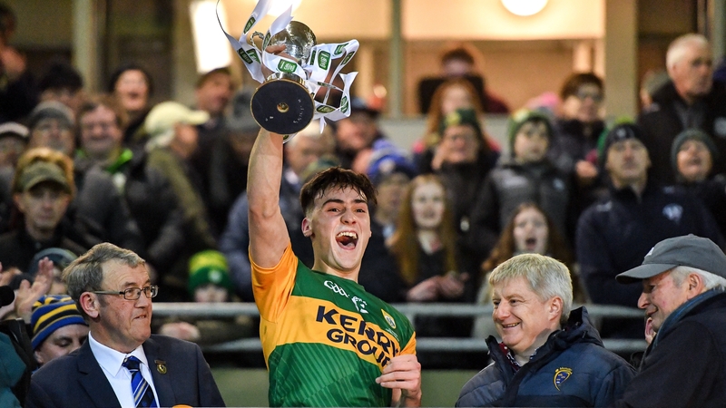 Kerry captain Paul O'Shea lifts the cup