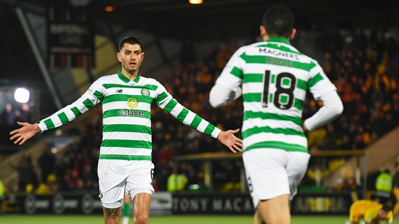 Celtic's Nir Bitton celebrates with Tom Rogic