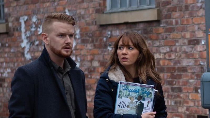 Gary and Maria watch as Ali is loaded into an ambulance