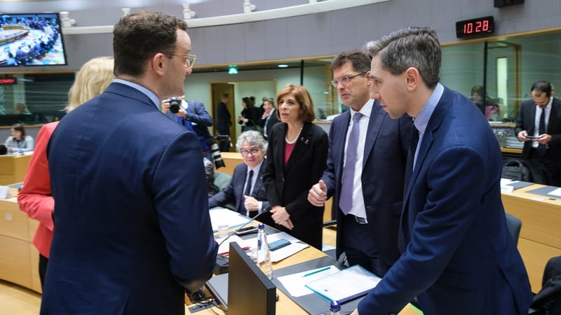Minister for Health Simon Harris (right) with other ministers prior the start of the meeting in Brussels