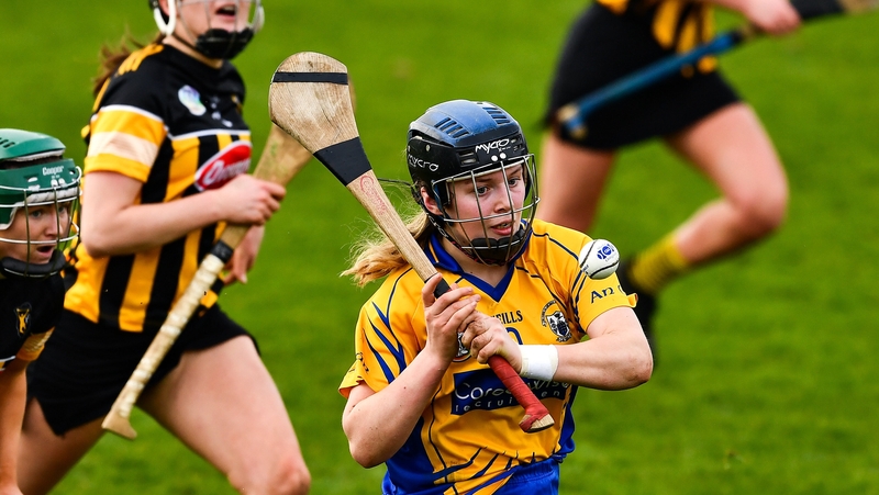 Gretta Hickey of Clare is tackled by Ciara O'Shea of Kilkenny