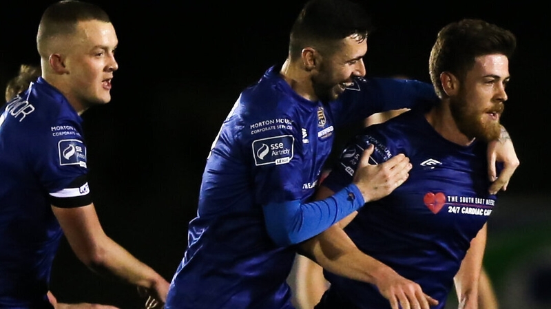 Sam Bone (R) is congratulated after drawing Waterford level