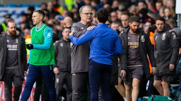 Leeds United manager Marcelo Bielsa comforts Huddersfield Town manager Danny Cowley after the match