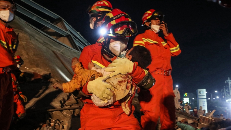 A boy was rescued from the rubble by firefighters