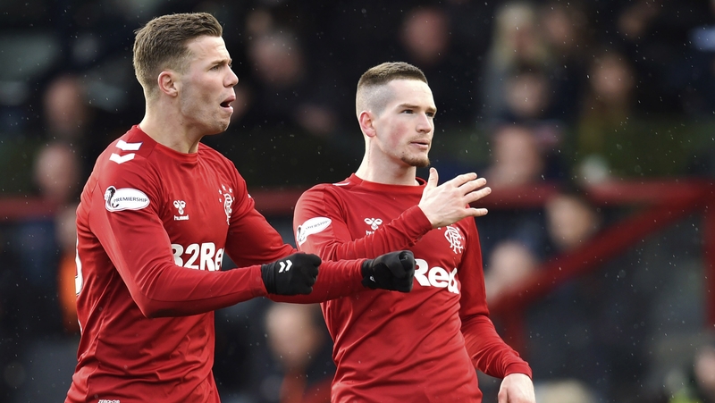 Kent (r) celebrates his goal
