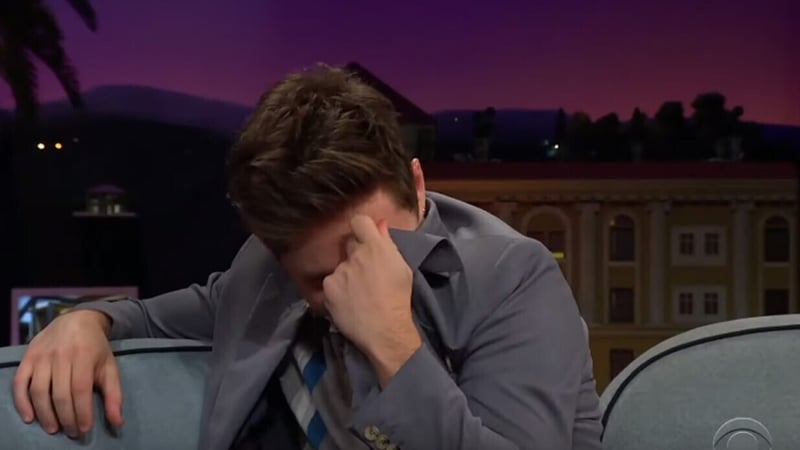 Niall Horan hid behind his jacket when one of 1D's first performance was shown