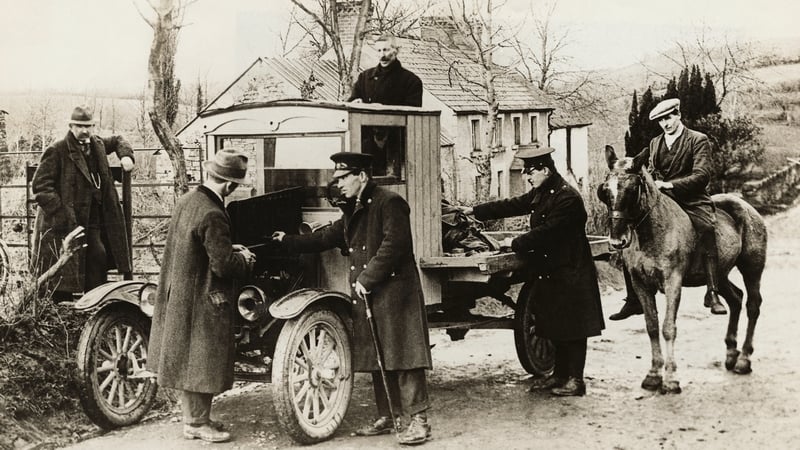 A truck returning from Northern Ireland is stopped and searched at the Irish Free State border by customs officers in 1925. Photo: George Rinhart/Corbis via Getty Images