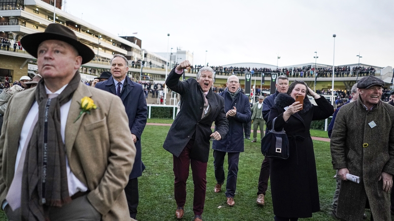 Connections of Ravenhill cheer on as it wins The National Hunt Challenge Cup Amateur Riders' Novices' Chase