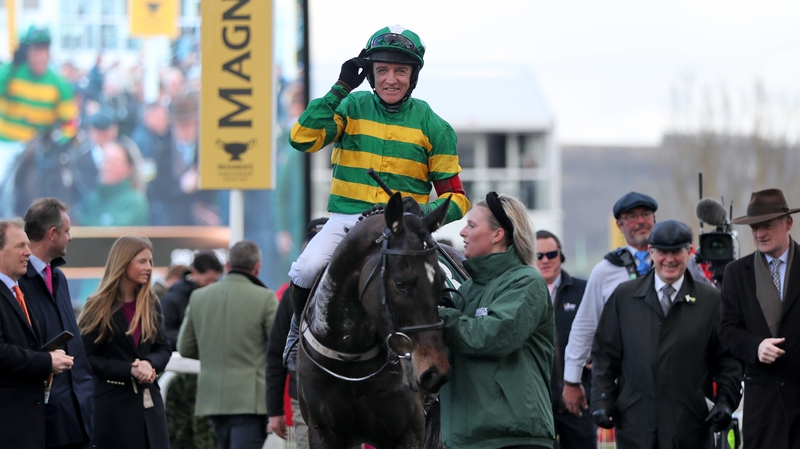 Jockey Barry Geraghty celebrates on Saint Roi after winning the Randox Health County Handicap Hurdle