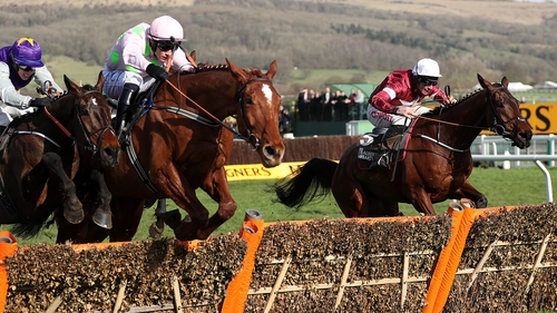 Monkfish ridden by Paul Towned (centre) jumps the last on the way to winning the Albert Bartlett Novices' Hurdle