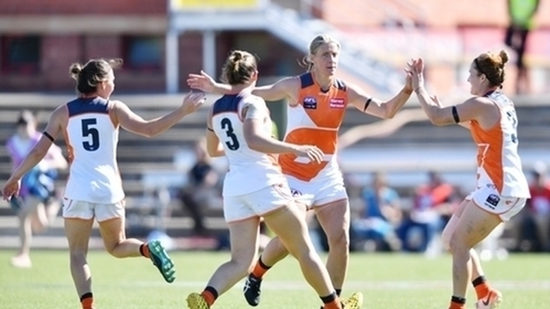 Cora Staunton takes the congratulations after her first goal