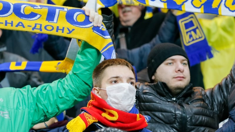 An FC Rostov fan wears a face mask during a Russian Premier League match against Lokomotiv Moscow