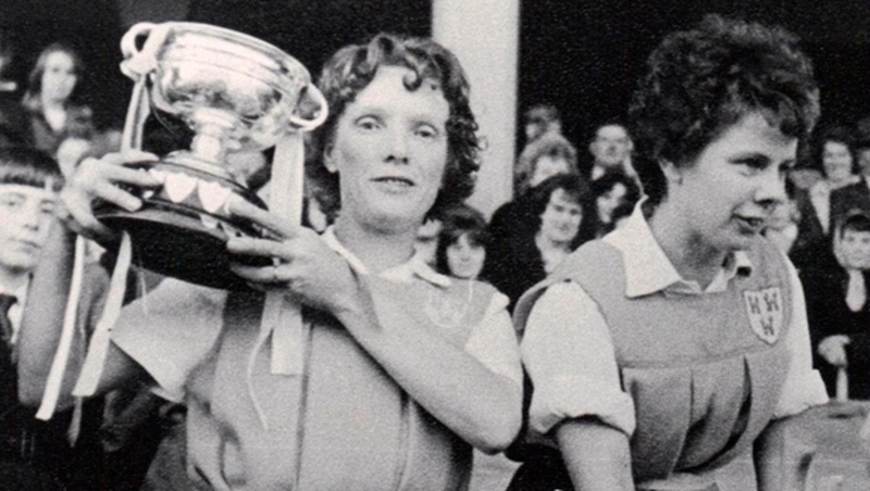 Hughes, right, after handing the O'Duffy Cup to Kay Mills in 1961 (image courtesy of camogie.ie)