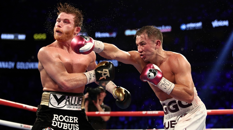 Gennady Golovkin punches Canelo Alvarez during their WBC/WBA middleweight title fight in 2018