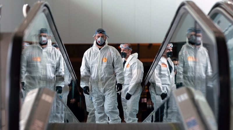 Members of the Spanish Army's Military Emergency Unit (UME) take part in the disinfection of El Prat airport in Barcelona