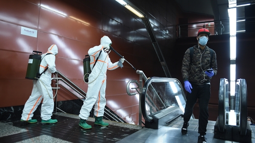 Spanish armed forces disinfect train station in Madrid