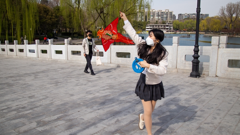 Life is slowly returning to normal in cities like Beijing and Shanghai though people are still wearing masks in public