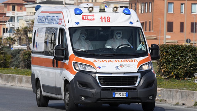An ambulance on the streets of Rome as new death toll is announced in Italy