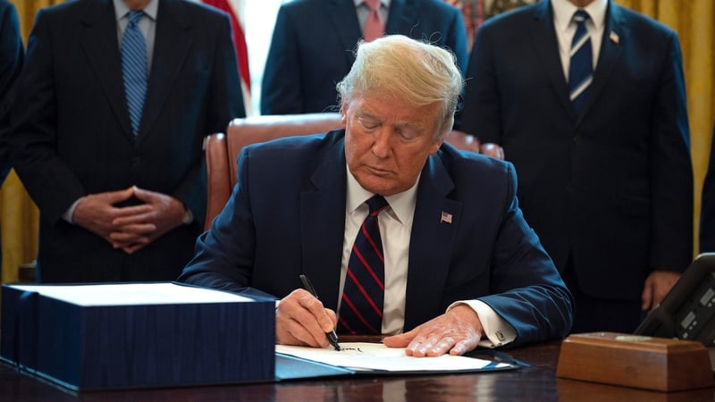 The US president hailed the massive financial package passed by Congress