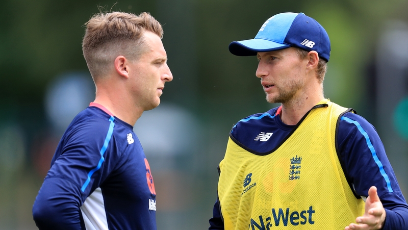 The wages of Joe Root (right) and Jos Buttler won't be reduced