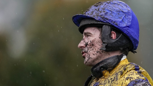 A mud-splattered Brian Hughes is pictured at Ascot earlier in the season