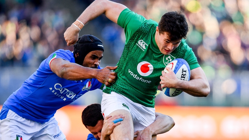 Maxime Mbanda (L) seen tackling Jacob Stockdale